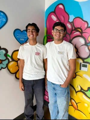 Two smiling brother volunteers.