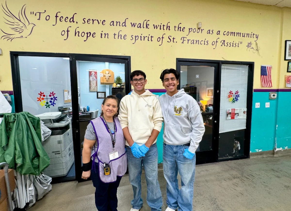 Youth Volunteers for a Feeding Program with their supervisor